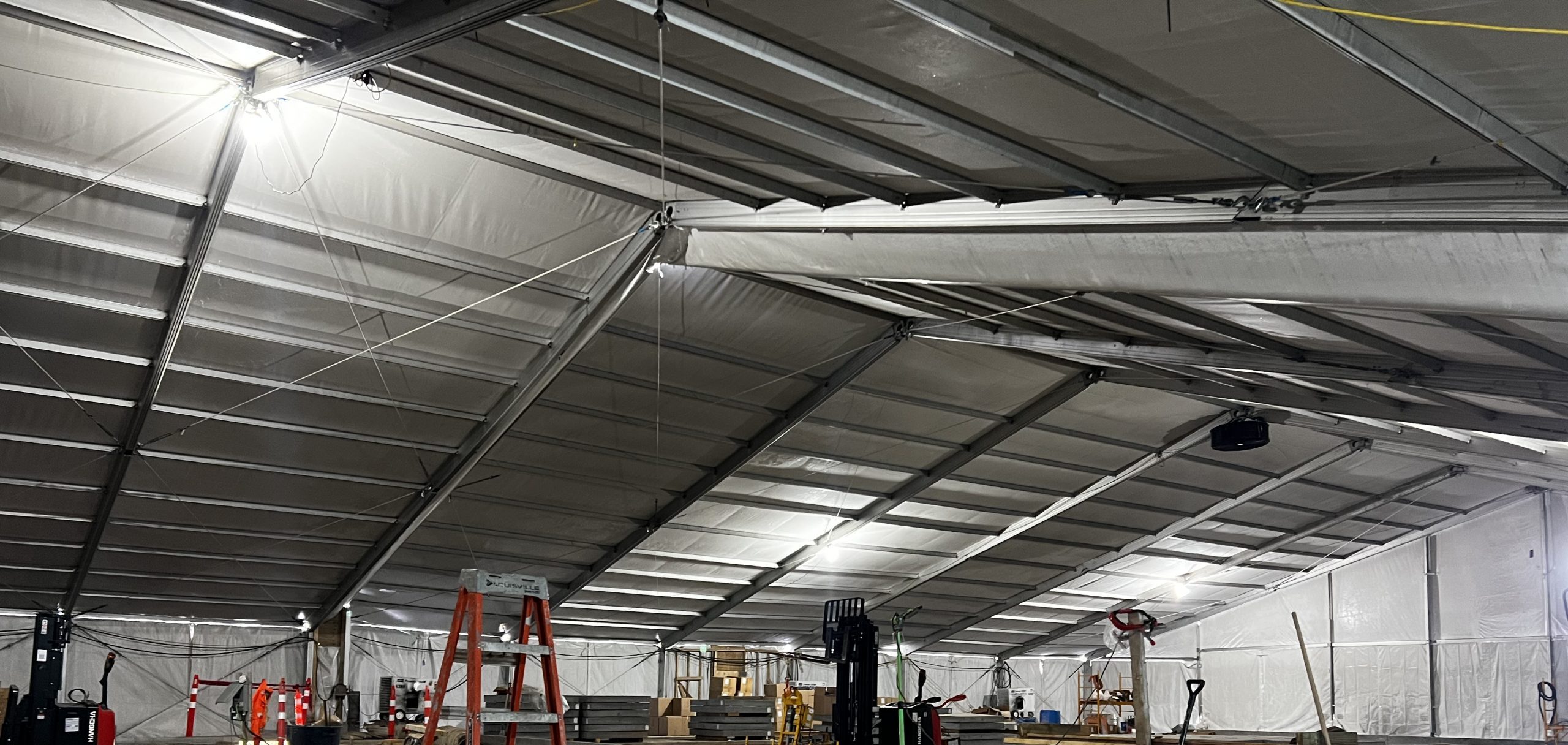 Temporary warehouse tent for inventory storage and logistics