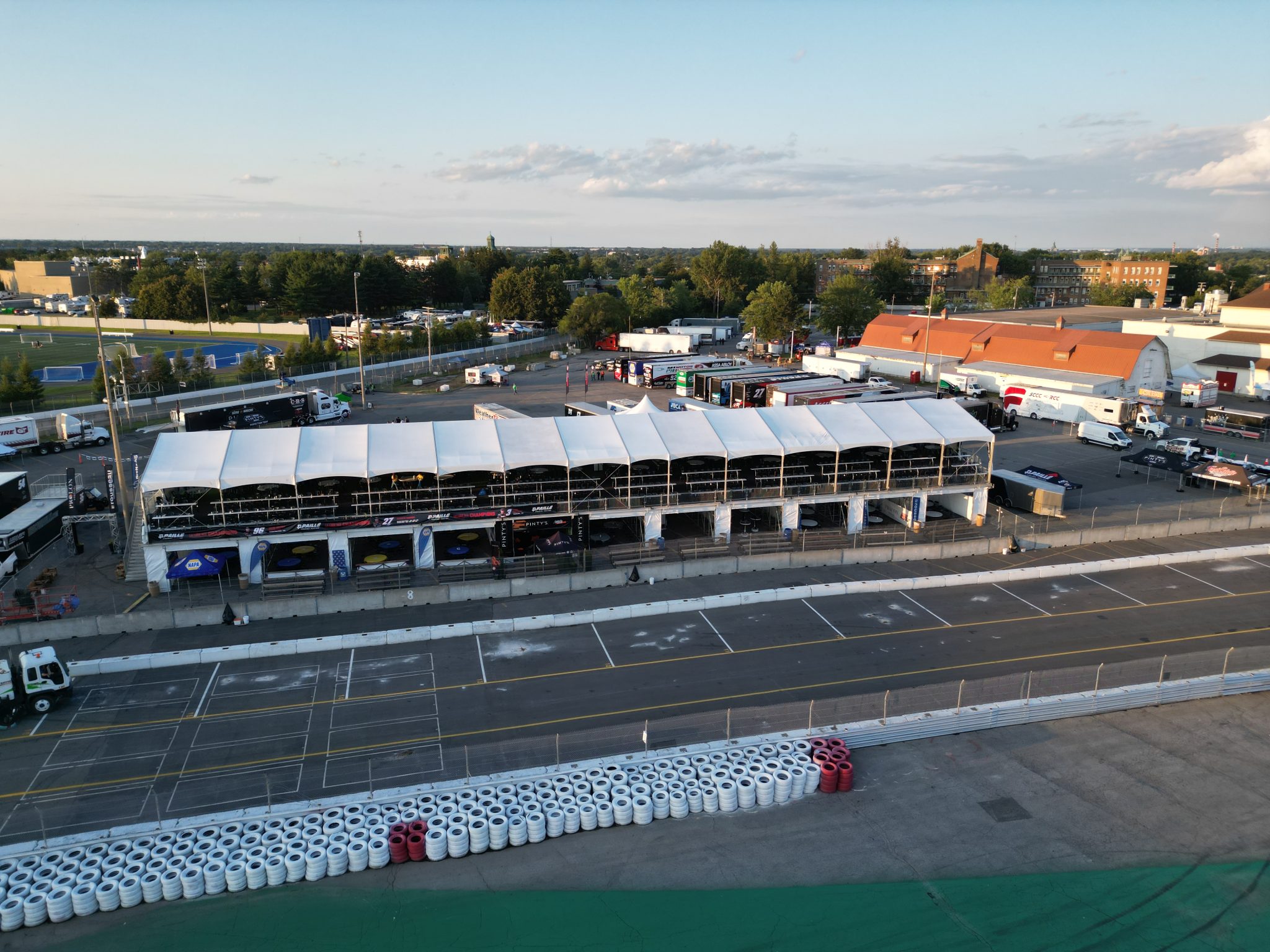 Double decker grand stand structure at Grand Prix Detroit with two-level spectator seating and weather protection