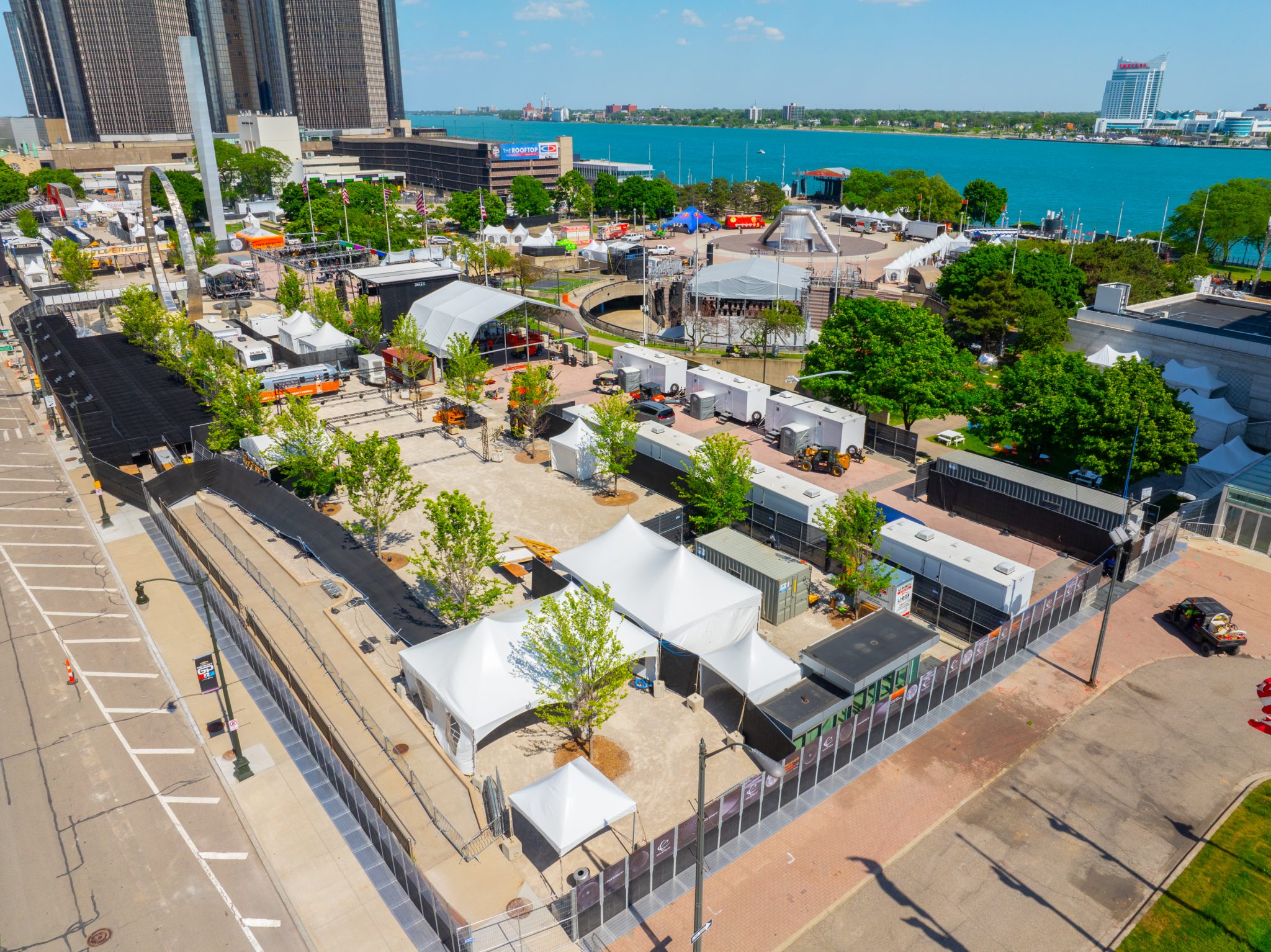 Aerial view of multiple event structure tents at Detroit Grand Prix waterfront venue serving different purposes