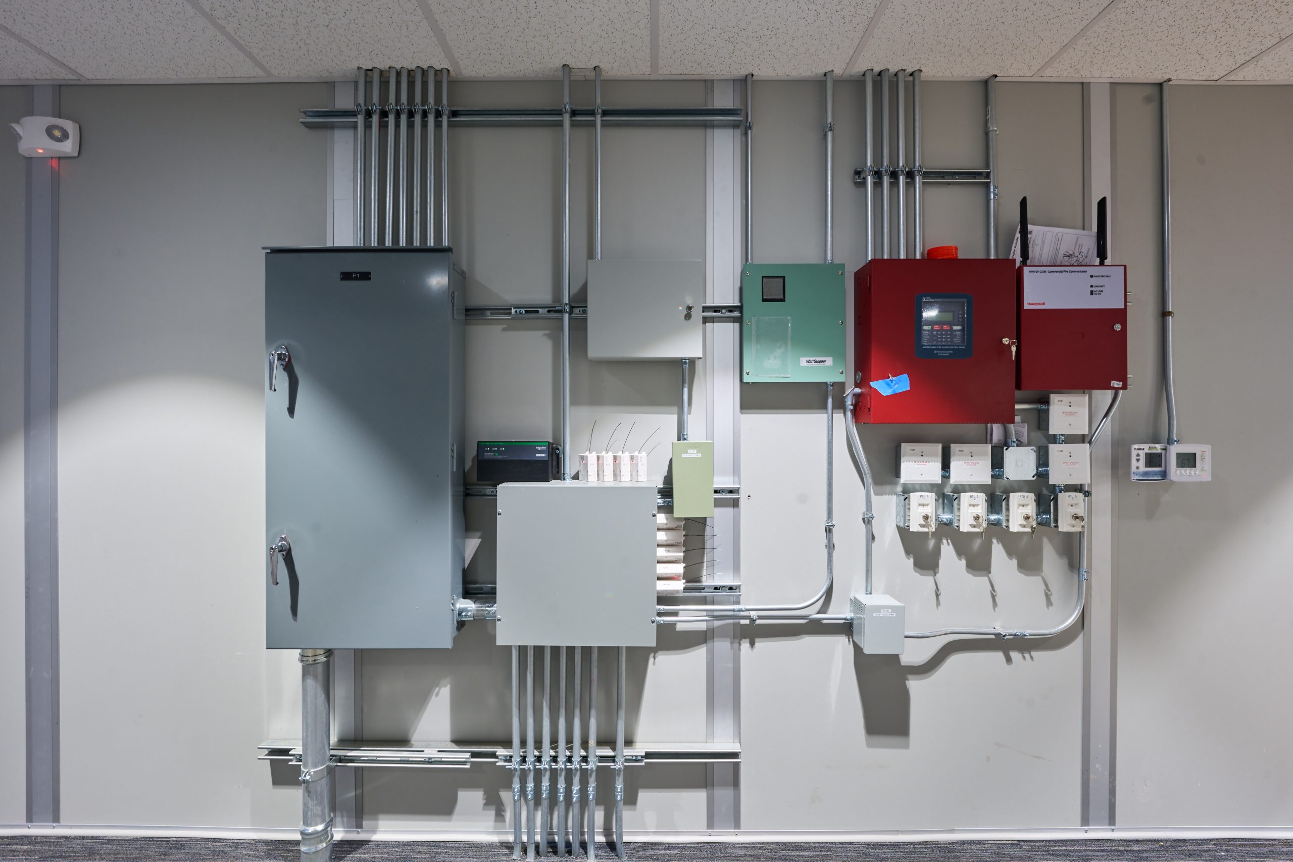 Code-Compliant Electrical & Fire Protection — Temporary Office Commercial electrical panels, fire alarm system, and power distribution in code-compliant temporary office building